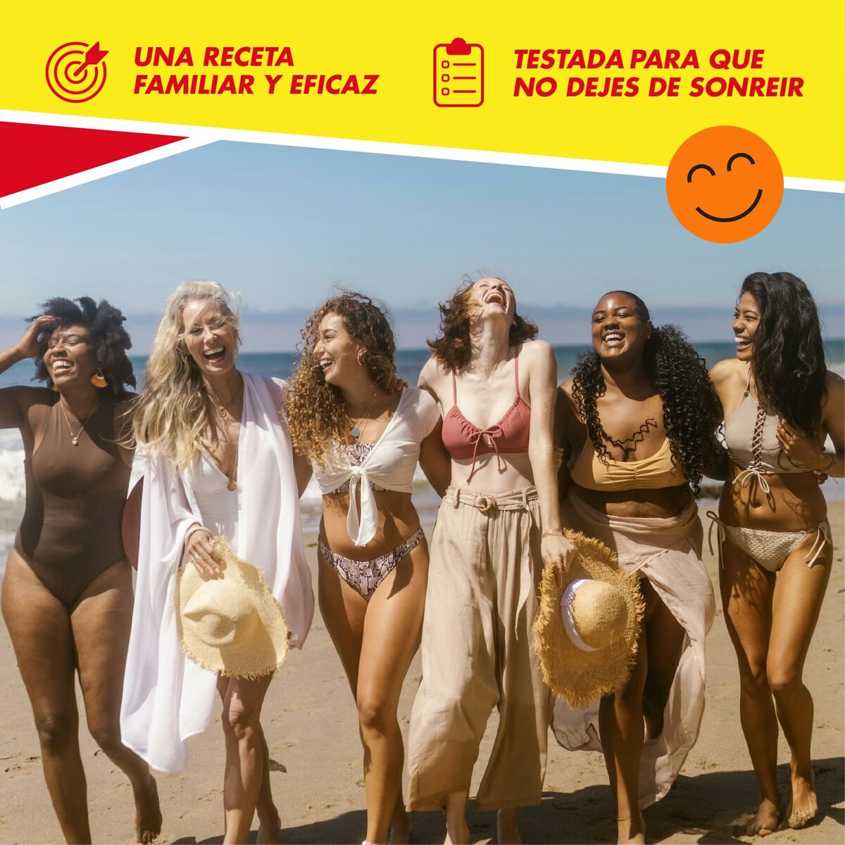 Six women in stylish swimwear laughing together on a beach, showcasing joy and confidence.