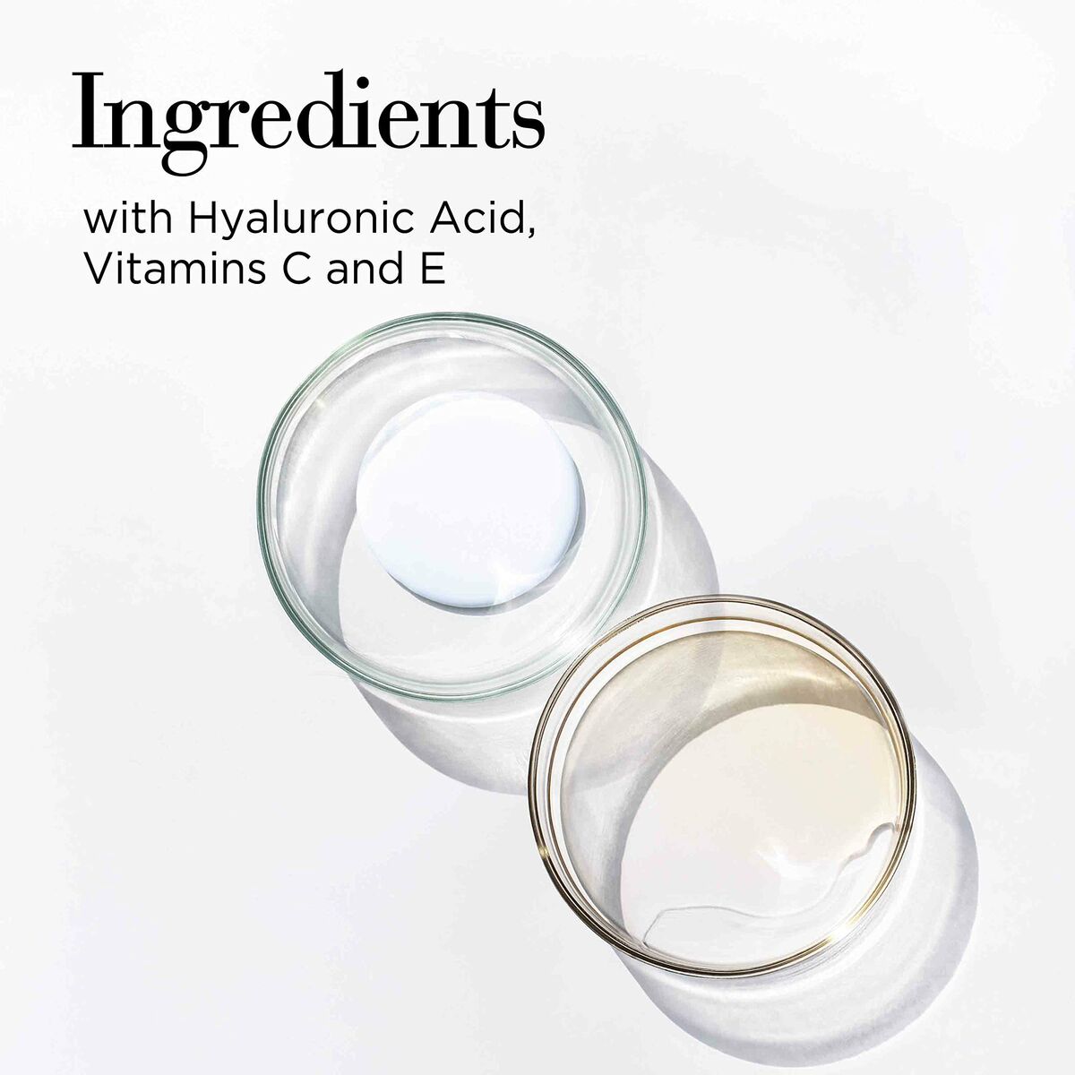 Two glass jars showcasing ingredients with hyaluronic acid, vitamins C and E.