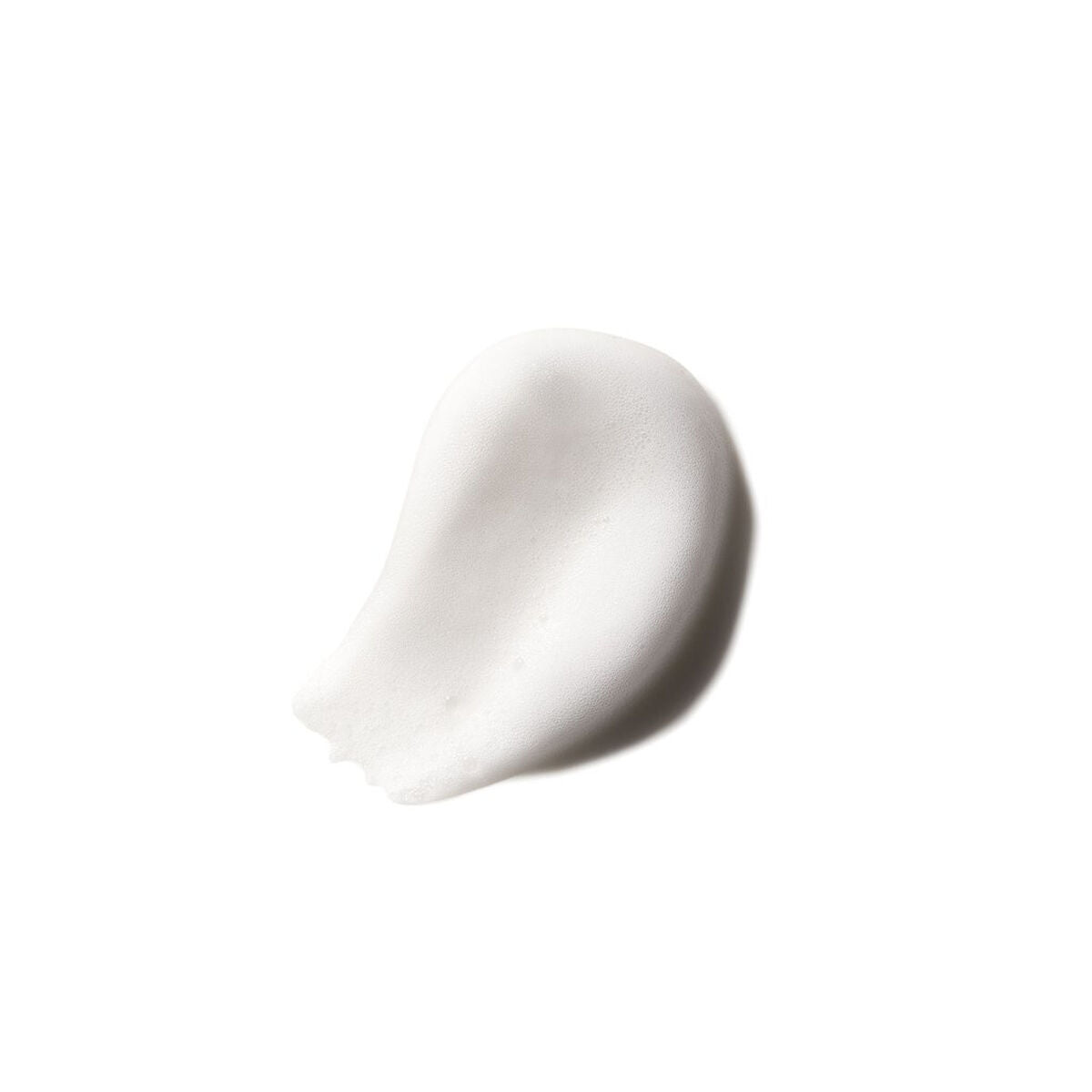Mousse volumatrice American Crew sur fond blanc, idéale pour donner du volume aux cheveux.