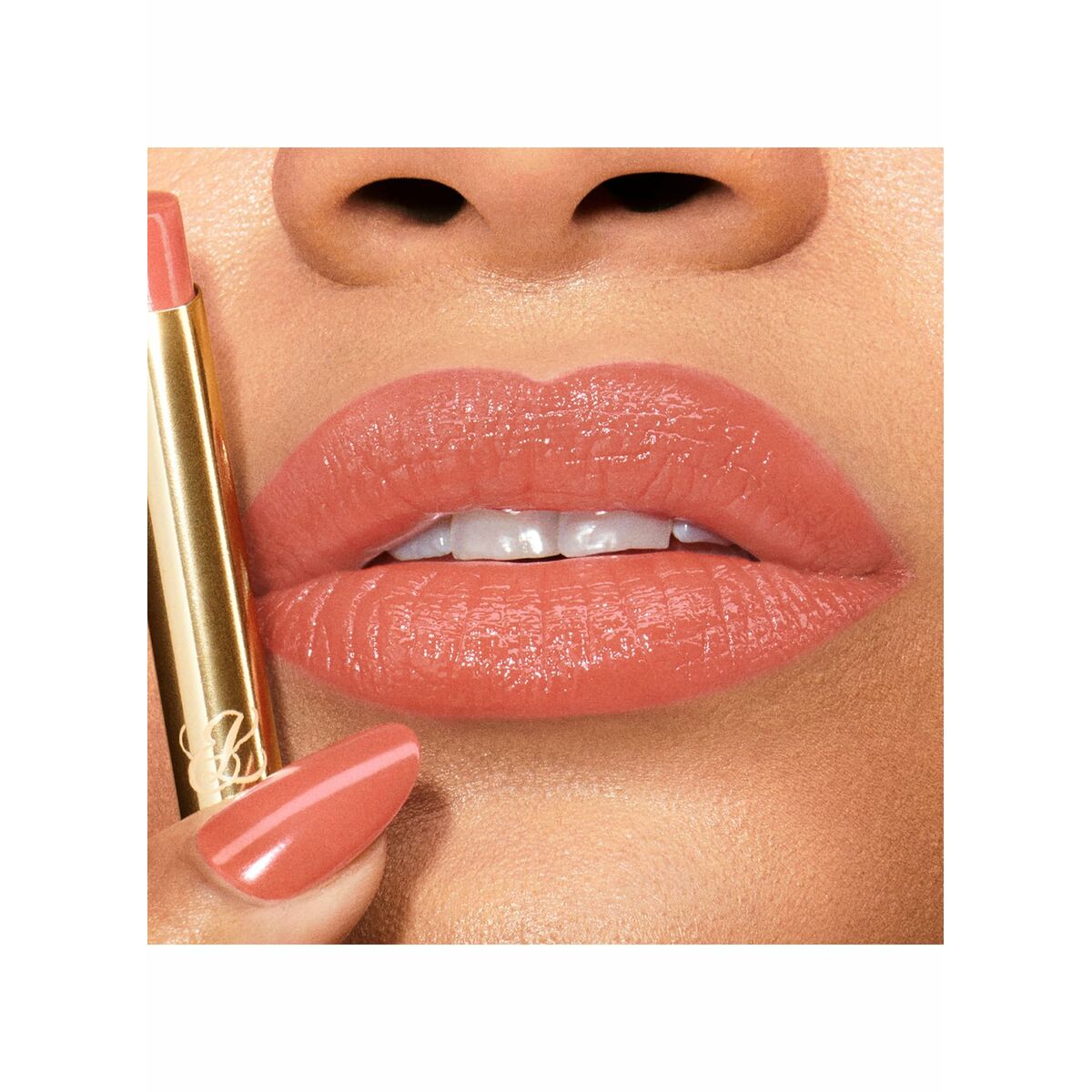 Lips adorned with Estee Lauder PURE COLOR Imaginary-07 lip color, showcasing a natural nude look.