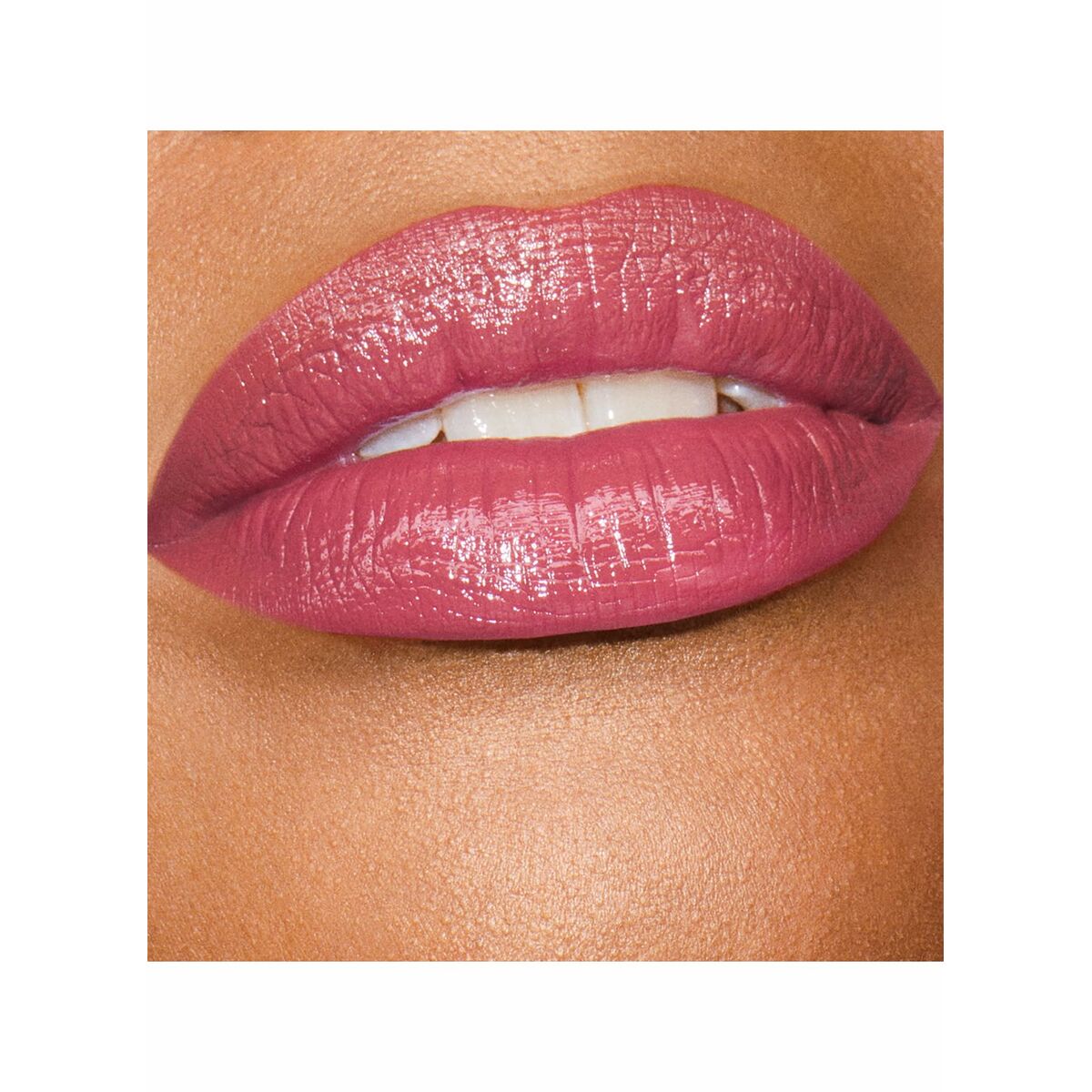 Close-up of lips wearing Estee Lauder PURE COLOR Eternity-10 Nº 119 lipstick, showcasing a beautiful pink shade.