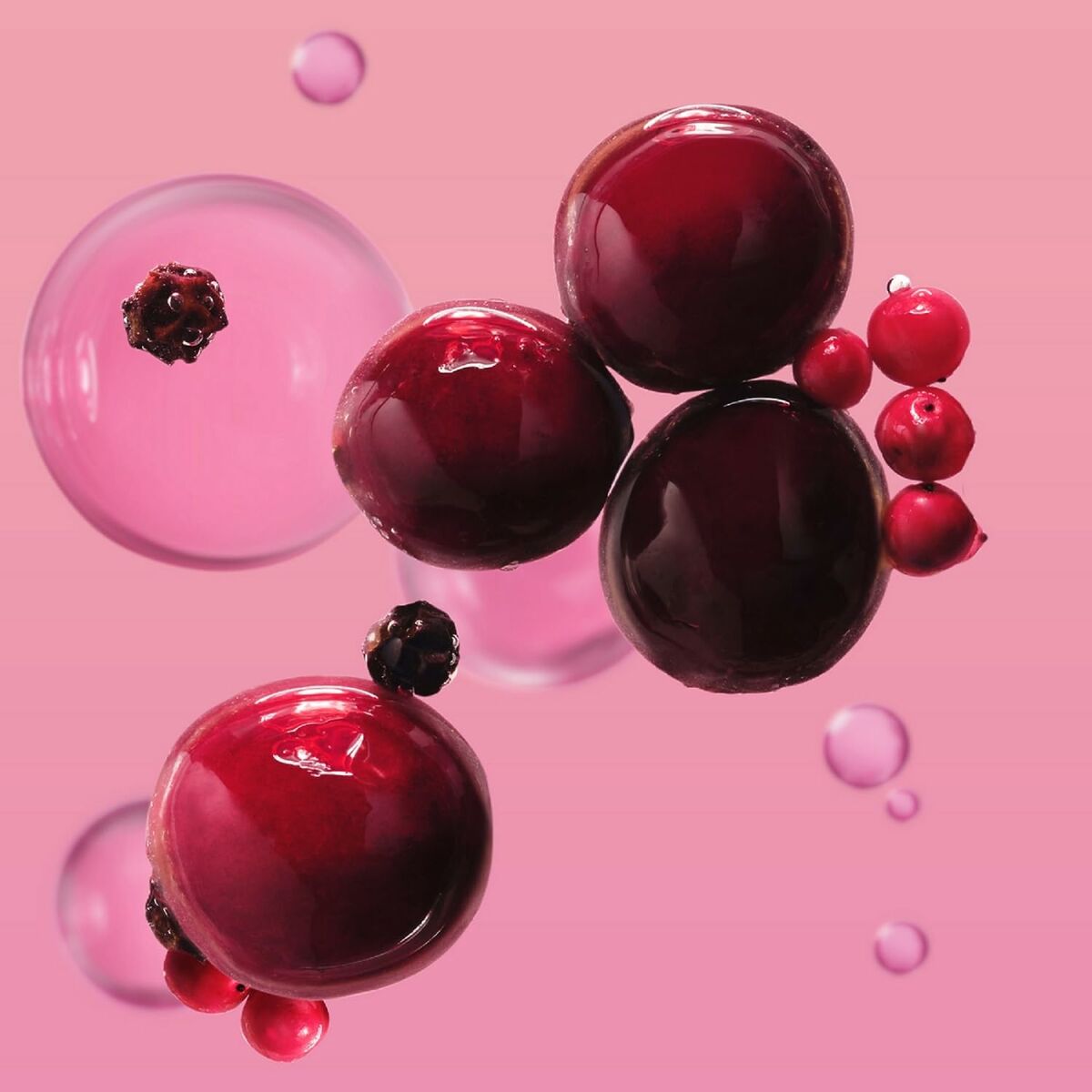 Illustration of Melvita L'OR ROSE body lotion ingredients, featuring vibrant berries and pink bubbles, enhancing skincare appeal.