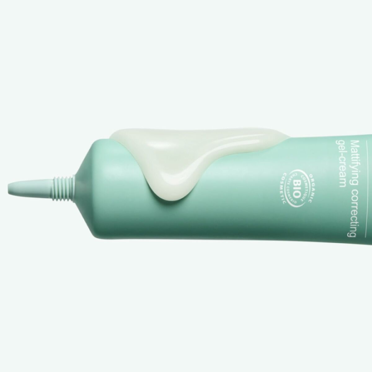 Crème visage Melvita NECTAR PUR in a tube with a creamy texture, showcasing its natural ingredients and eco-friendly design.
