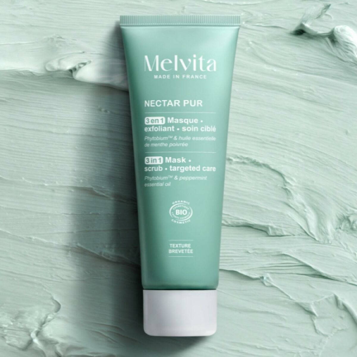 Melvita NECTAR PUR 3in1 Mask in a green tube, featuring natural exfoliating formula for skincare.