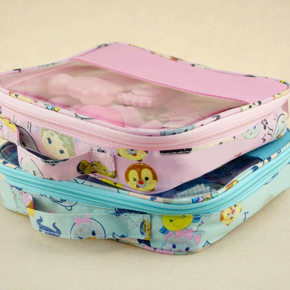 Colorful kids' storage bags with cartoon designs, perfect for organizing toys and accessories.