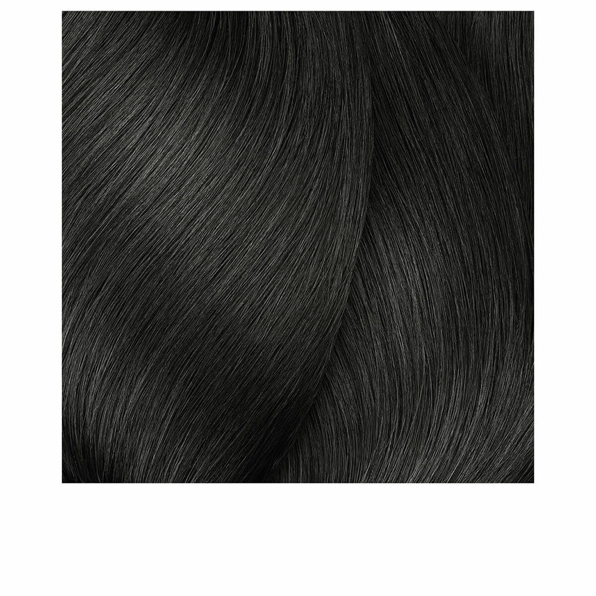Texture of smooth black hair showcasing shine and health, ideal for hair care products such as L'Oreal MAJIREL.