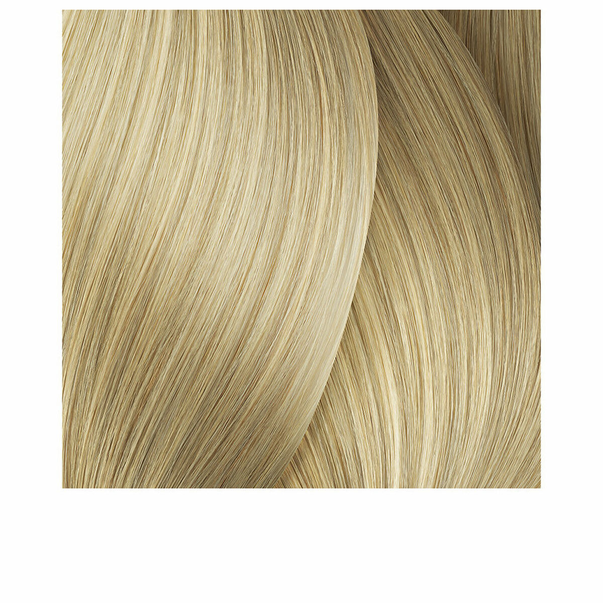 Close-up of smooth, light beige hair strands showcasing a beautiful hair color texture.