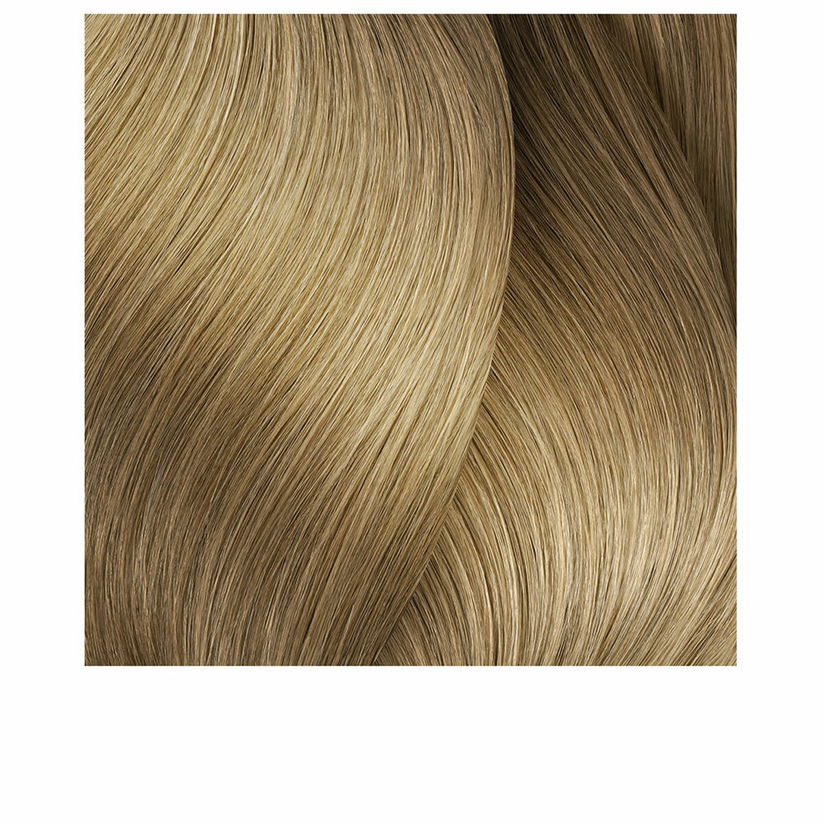 Gorgeous wavy hair texture in a light blonde color showcasing the results of L'Oreal Professionnel Paris MAJIREL.