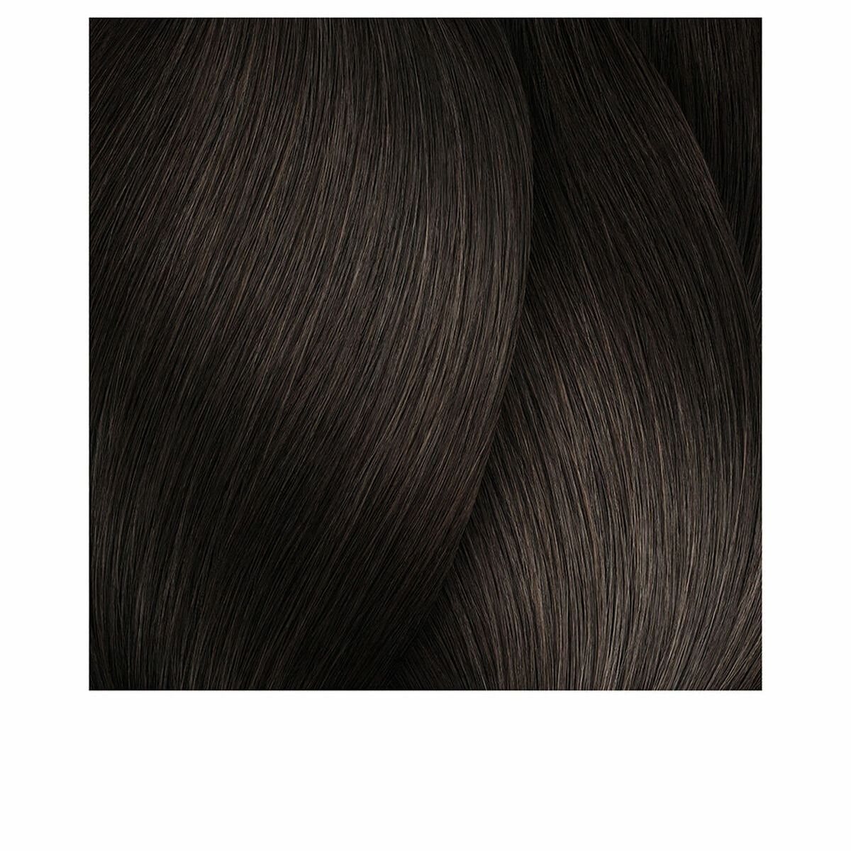 Textured close-up of dark brown hair strands representing L'Oreal Professionnel Paris MAJIREL color Nº 5.8.