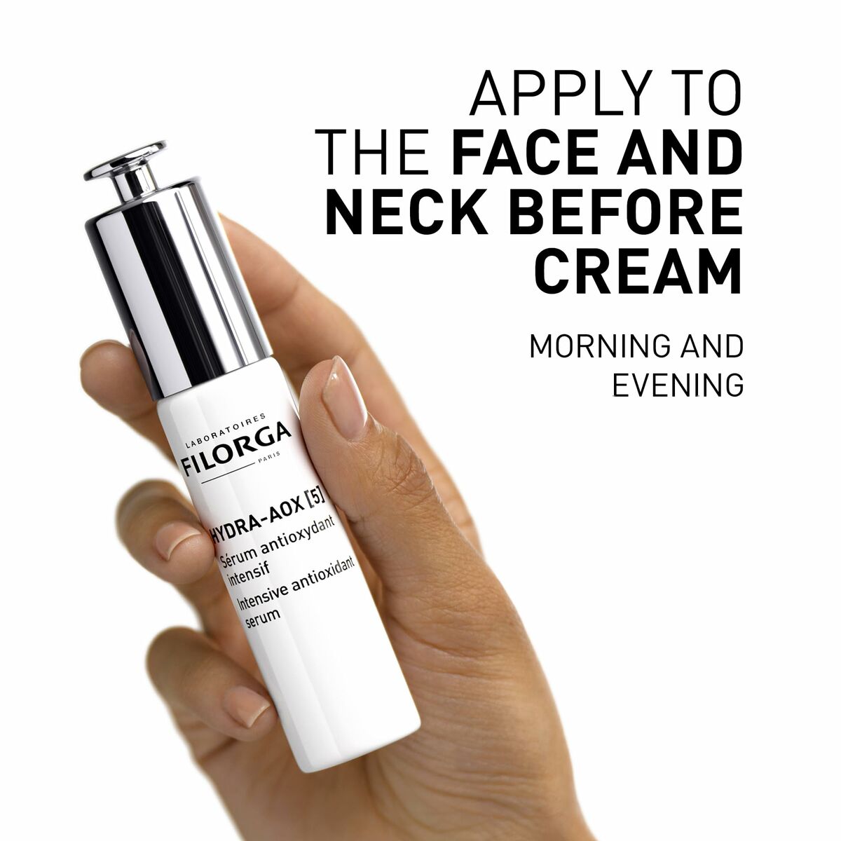 Filorga Hydra-AOX serum being applied to face and neck, ideal for morning and evening skincare routines.
