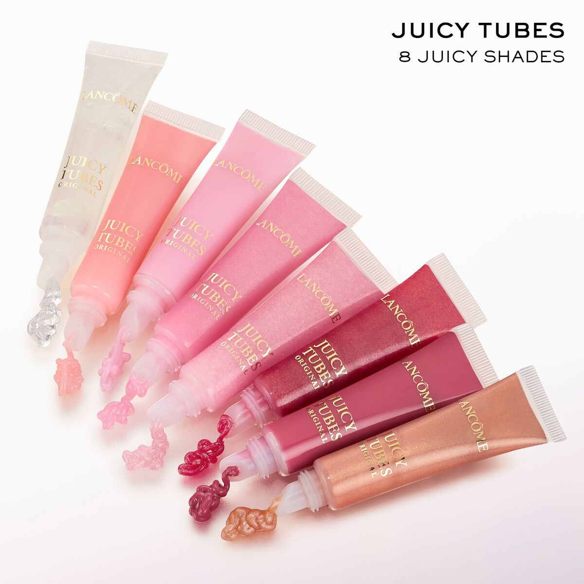 Rouge à lèvres Lancôme JUICY TUBES in 8 vibrant shades displayed in tubes with glossy finishes.