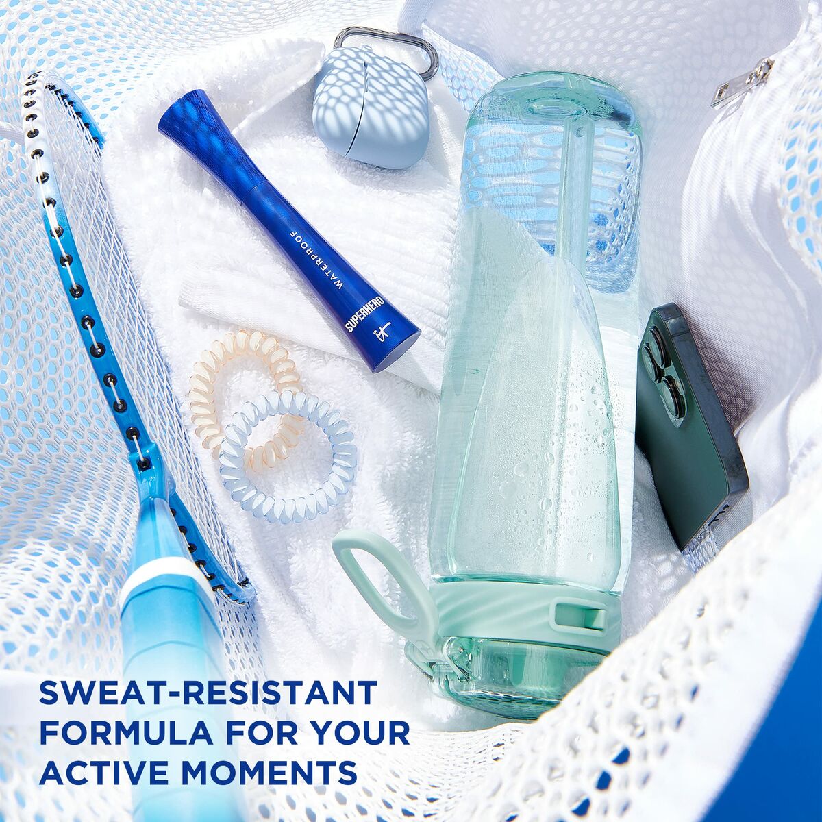 Active lifestyle essentials including a water bottle, hair ties, and sweat-resistant cosmetic product.