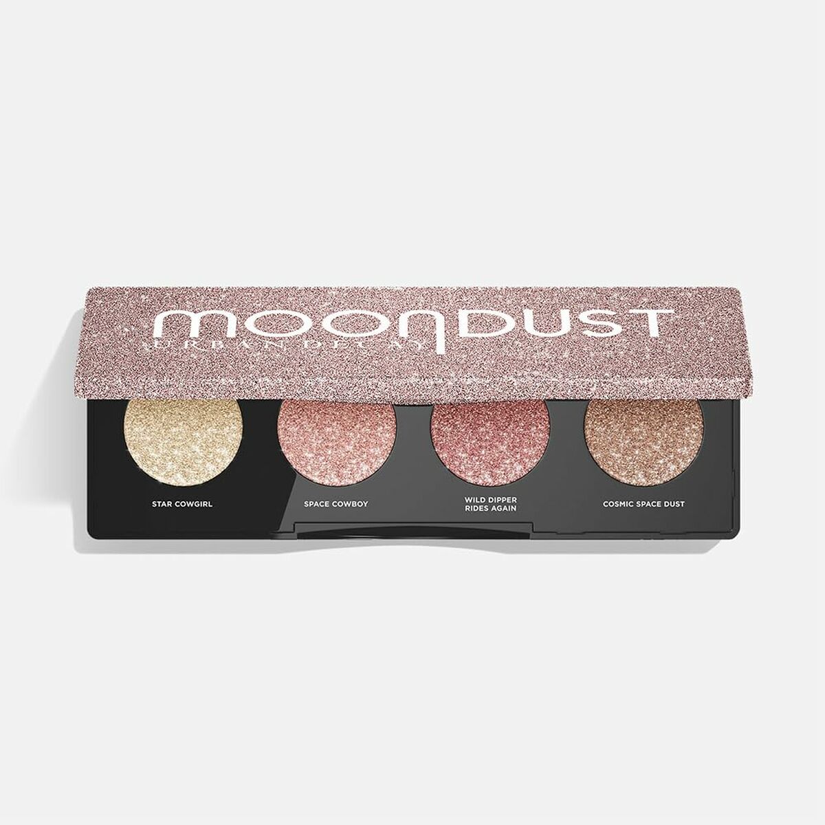 Palette d'ombres à paupières Urban Decay Moondust avec quatre teintes étincelantes.