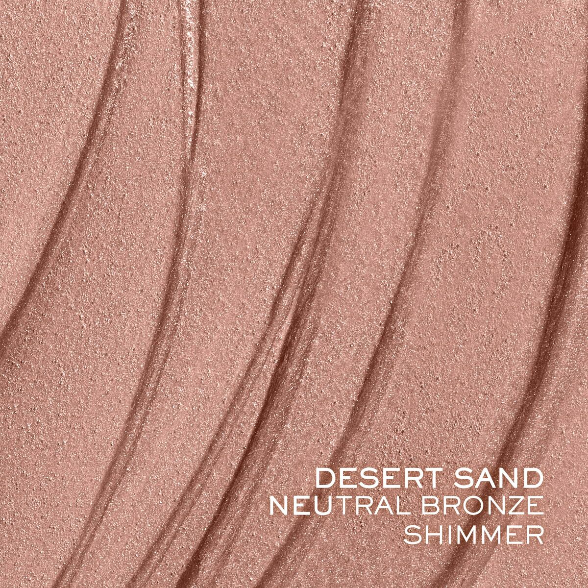 Neutral bronze shimmer in Desert Sand texture, showcasing smooth, wavy finish ideal for versatile makeup looks.