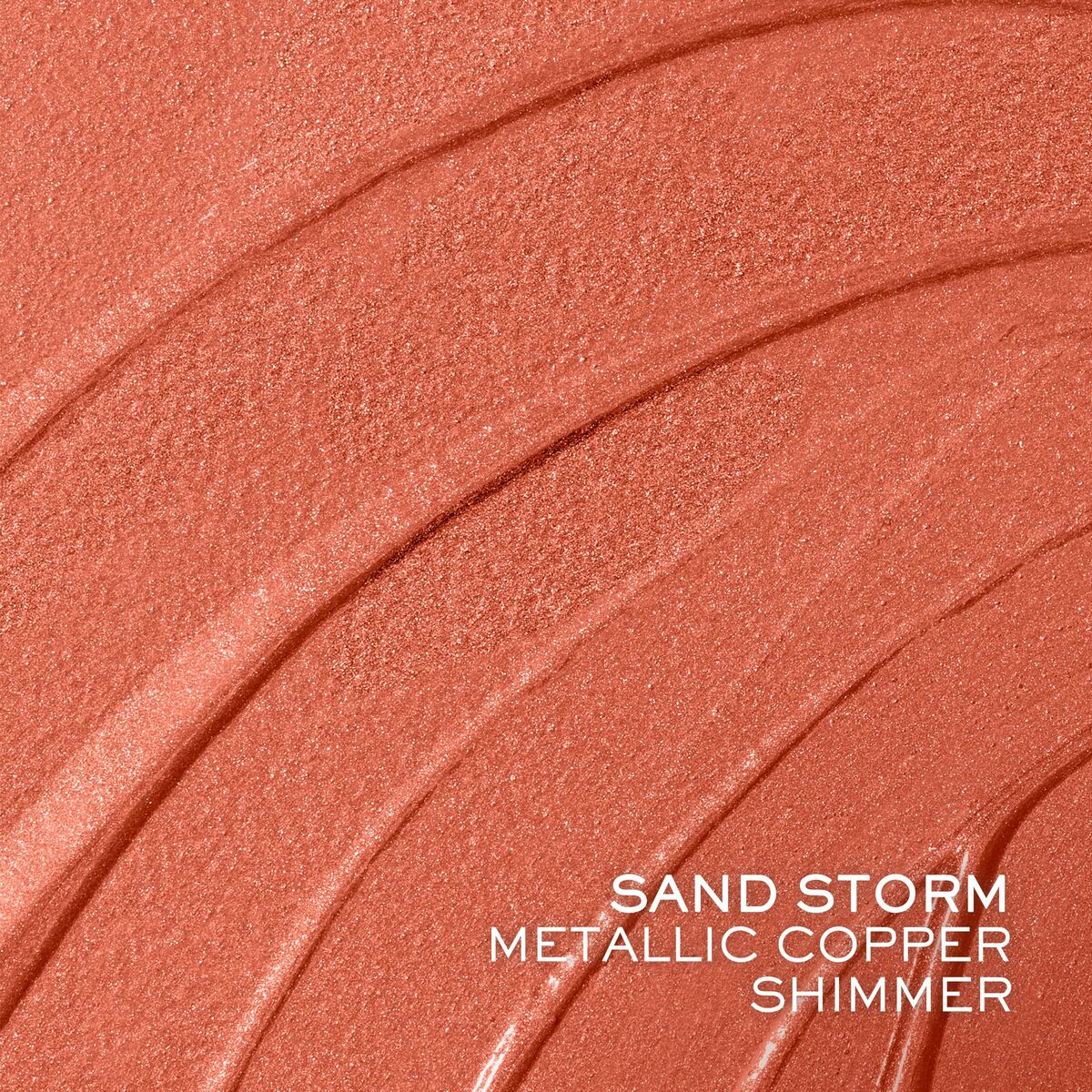Close-up of Sand Storm metallic copper shimmer makeup, showcasing a liquid texture and shimmering finish.