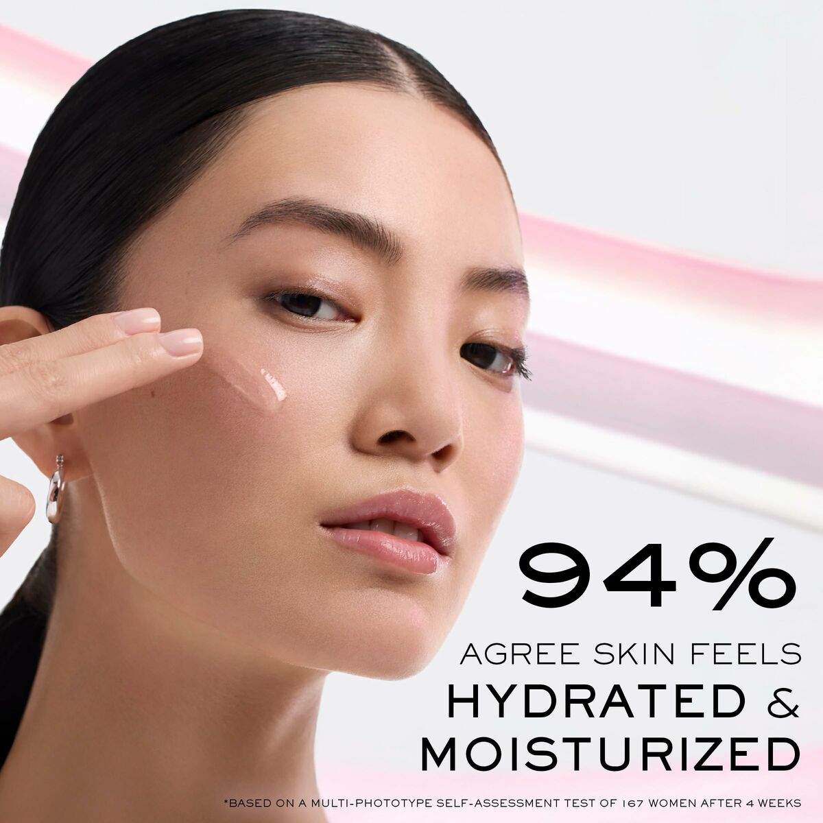 Close-up of a woman applying skincare, showcasing hydrated and moisturized skin with a 94% satisfaction rate.