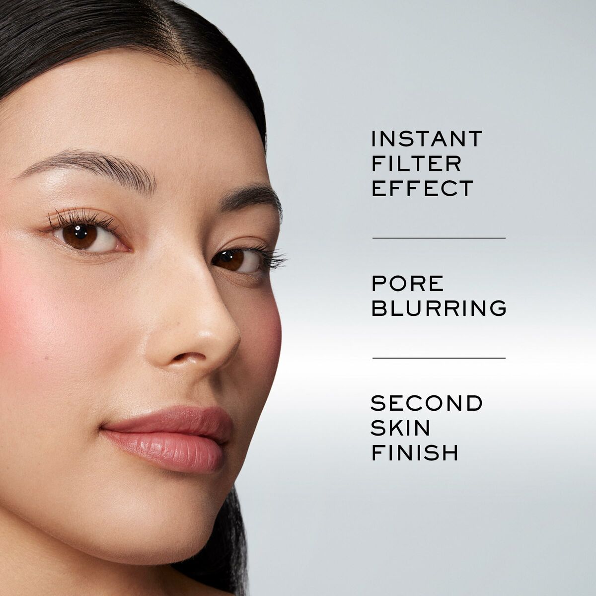 Close-up of a woman showcasing makeup features: instant filter effect, pore blurring, second skin finish.