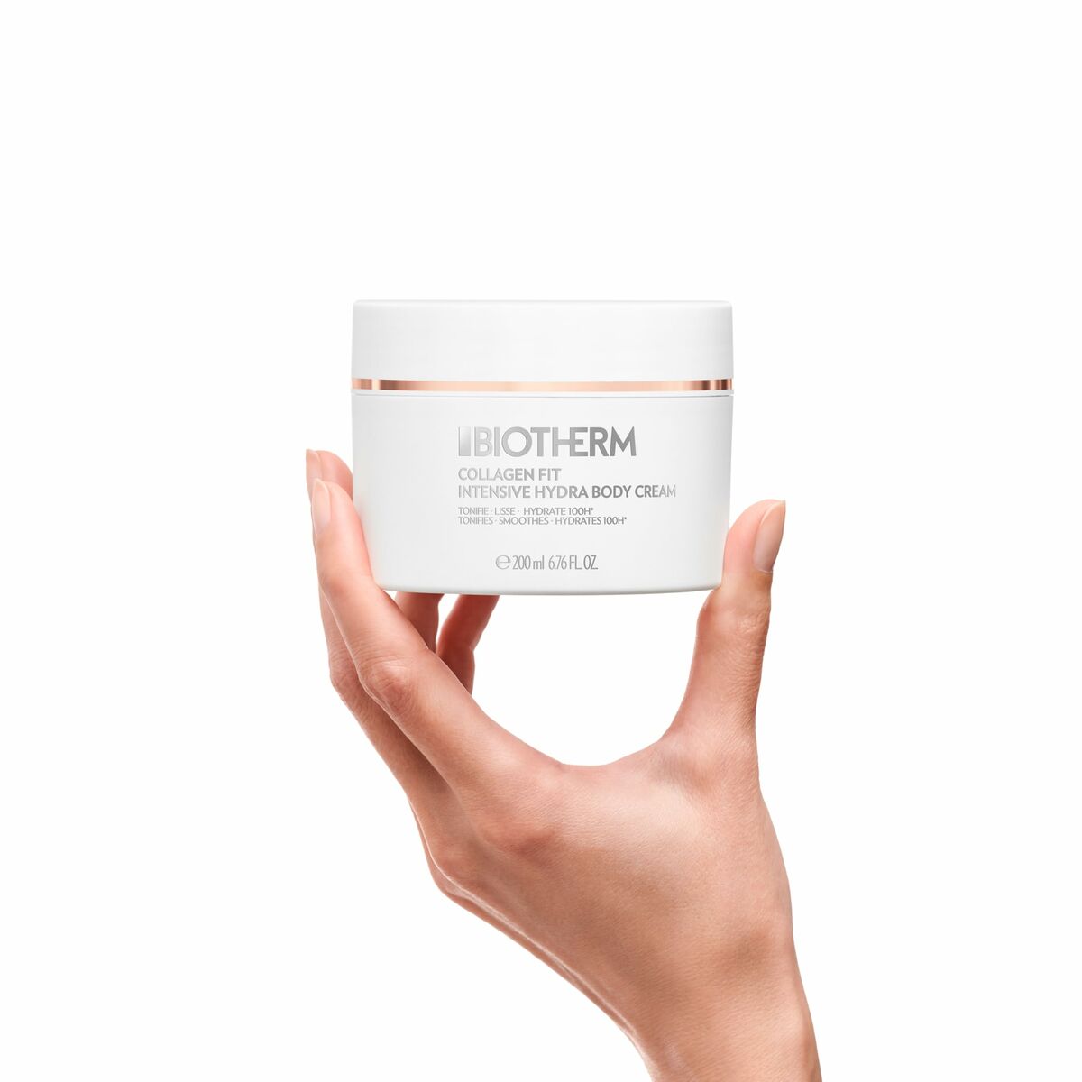 Biotherm Collagen Fit Intensive Hydra Body Cream in a hand, showcasing its moisturizing benefits and luxurious design.