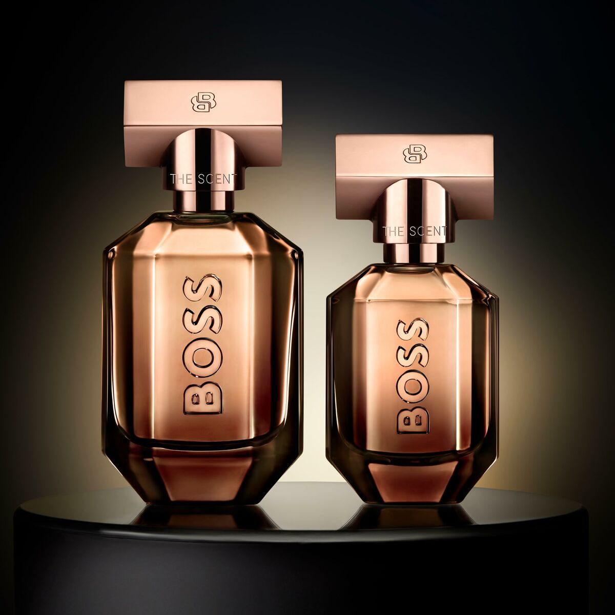 Hugo Boss THE SCENT FOR HER unisex perfume bottles on display, showcasing elegant design and 50 ml capacity.