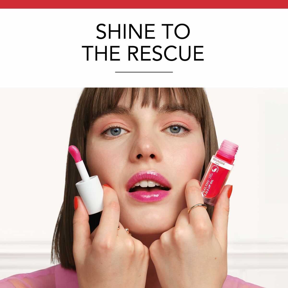 Model showcasing Bourjois Healthy Mix S.O.S lipstick in Straw'bisous, highlighting vibrant pink lip color and shine.
