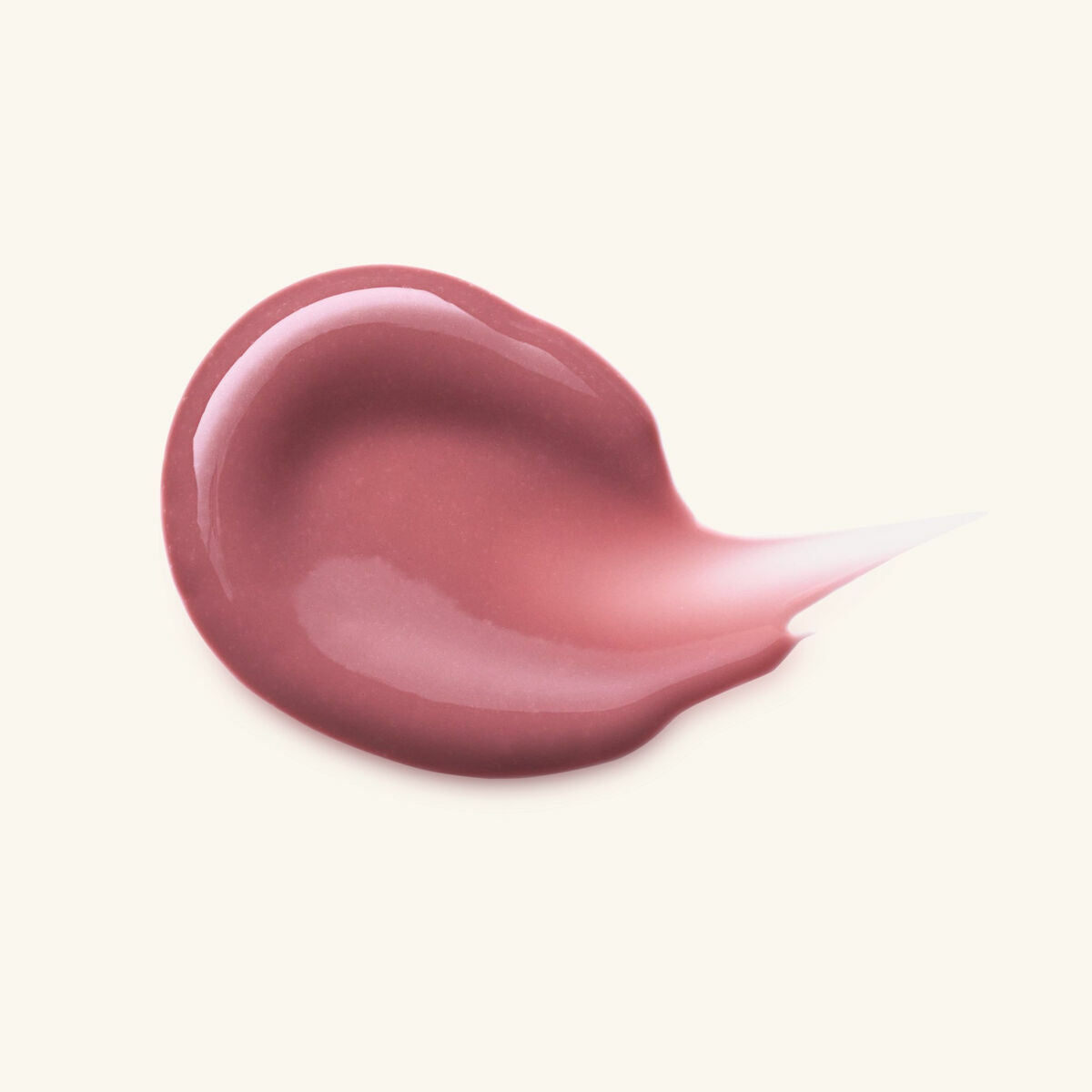Swatch of Catrice Plump It Up liquid lipstick in a soft pink shade, showcasing its glossy finish.