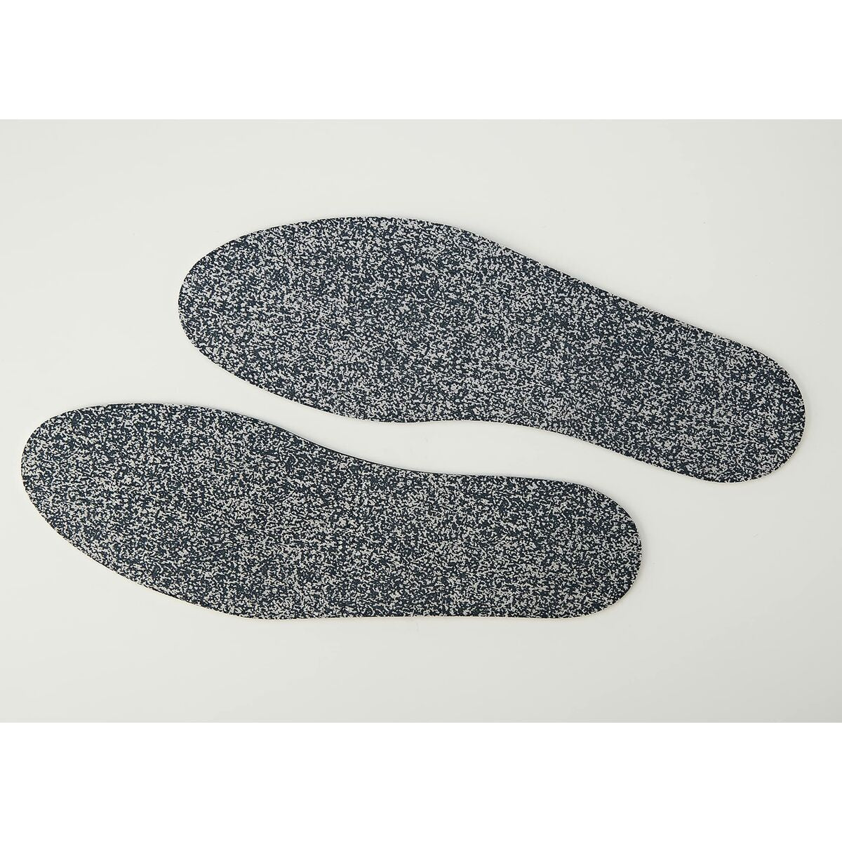 Semelle intérieure en mousse avec motif texturé pour un confort optimal, idéale pour chaussures.