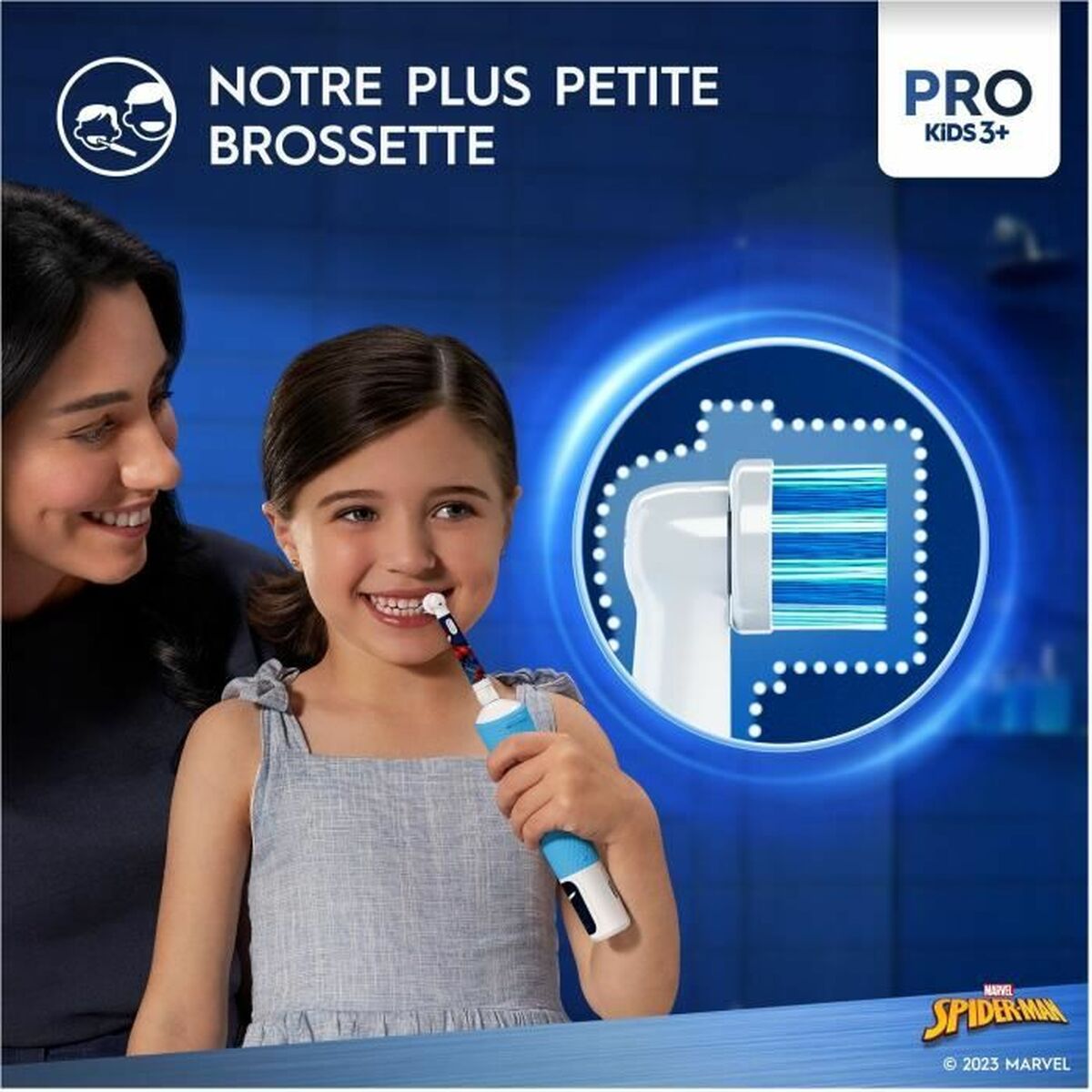 Image of a child happily using a Spider-Man themed electric toothbrush, highlighting its small brush head for kids.