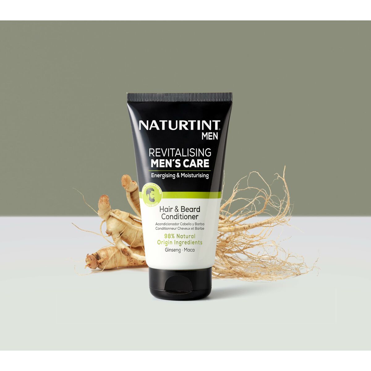 Naturtint MEN Revitalising Hair & Beard Conditioner tube on a pastel background, promoting energizing and moisturizing care.