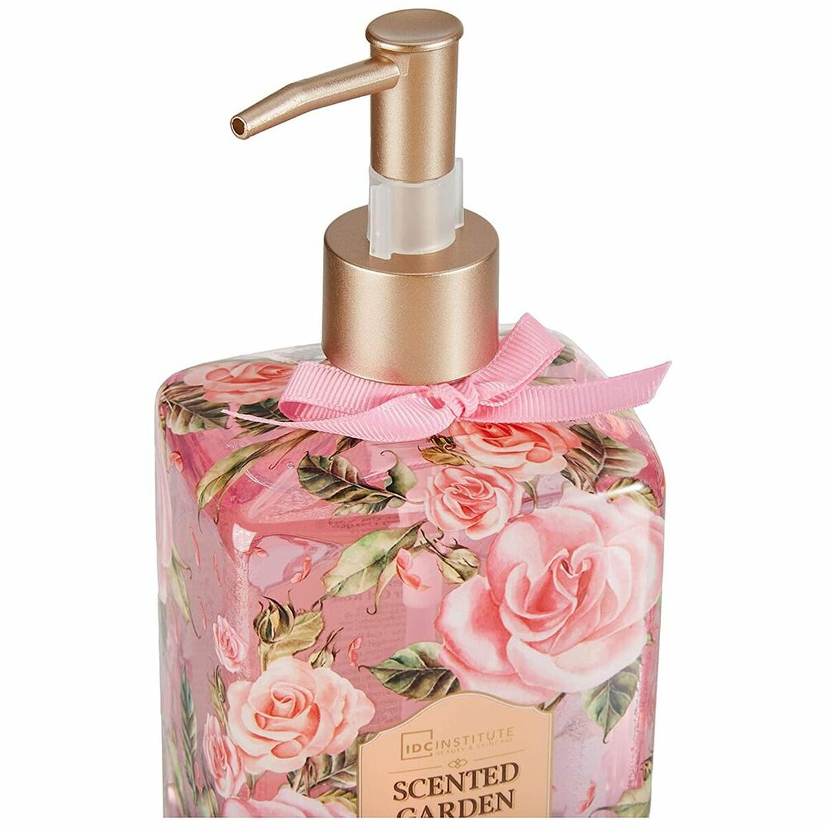 Gel de douche IDC Institute de 780 ml avec design floral, pompe dorée et arôme de roses.