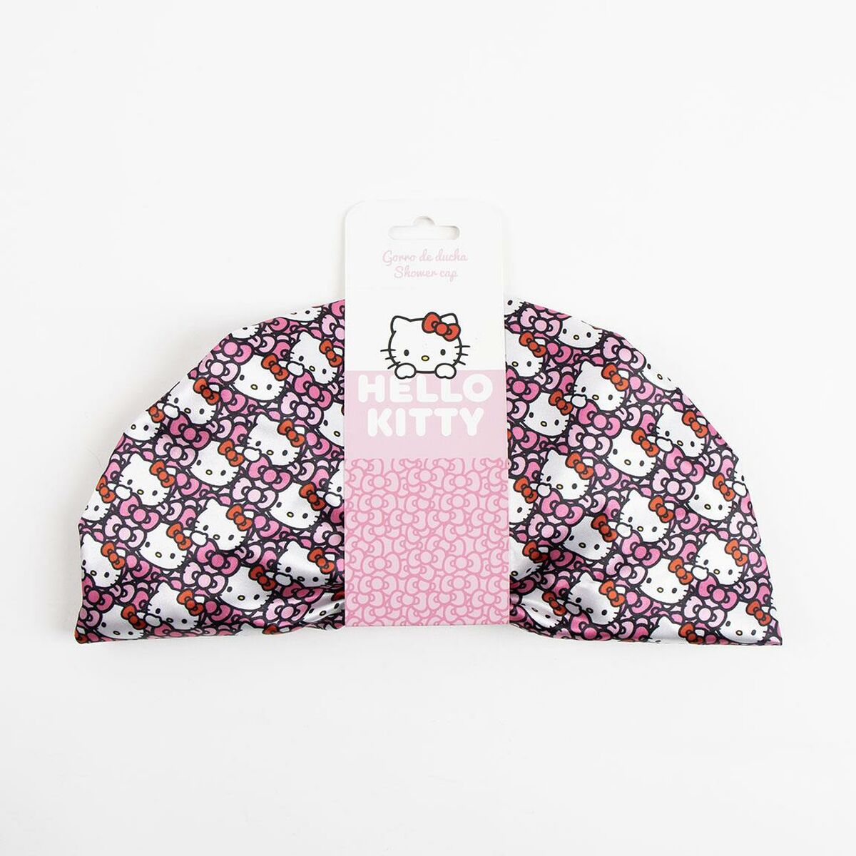 Bonnet de Douche Hello Kitty rose en polyester avec motifs colorés, idéal pour l'hygiène personnelle.