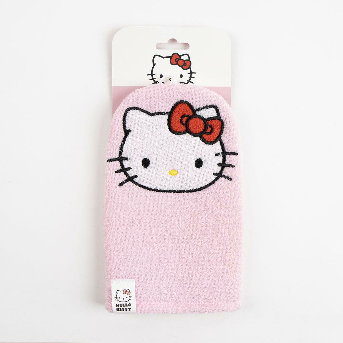 Gant de toilette Hello Kitty rose avec motif de la célèbre petite chatte, idéal pour l'hygiène intime quotidienne.