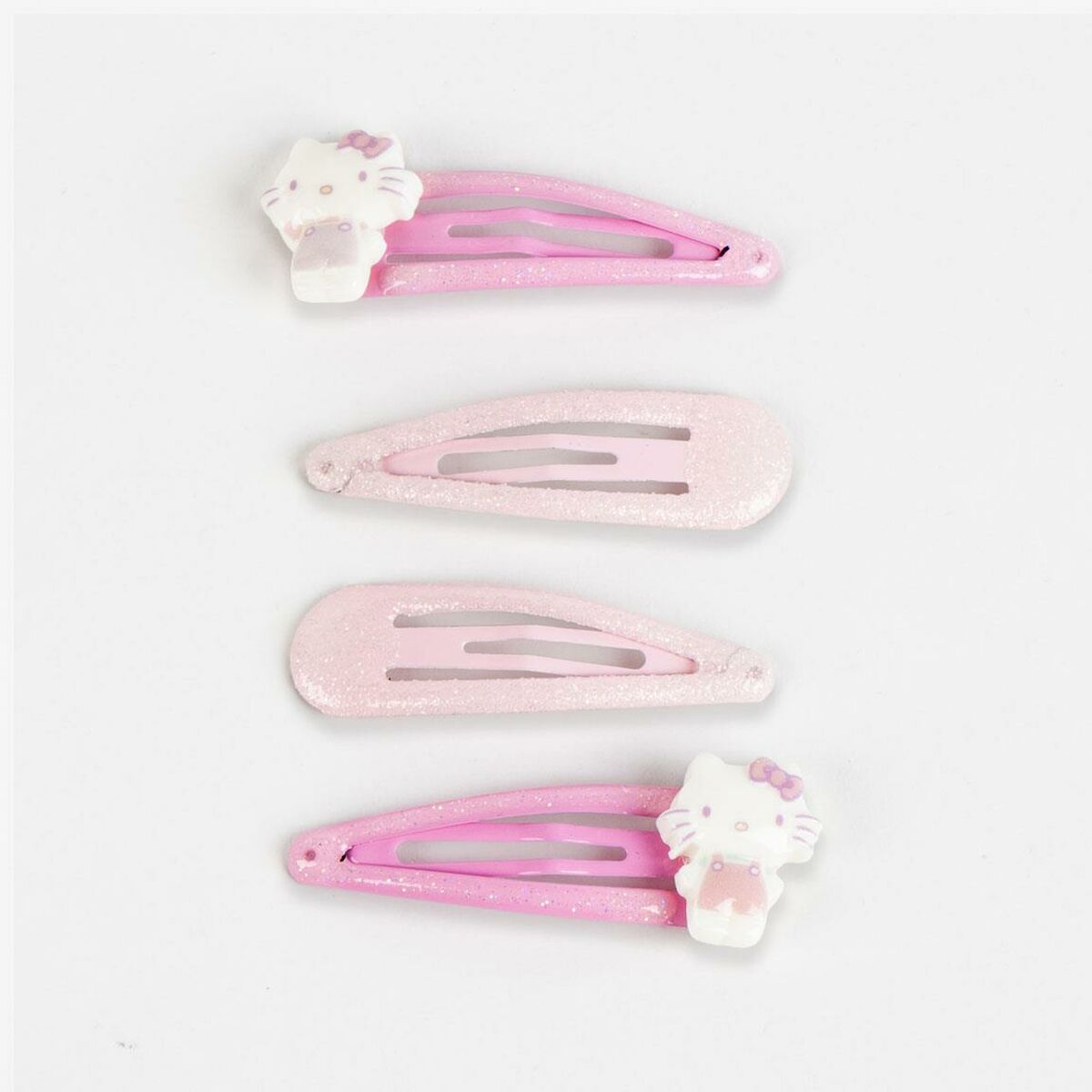 Ensemble de 4 accessoires pour cheveux Hello Kitty rose avec clips scintillants et motif de personnage.
