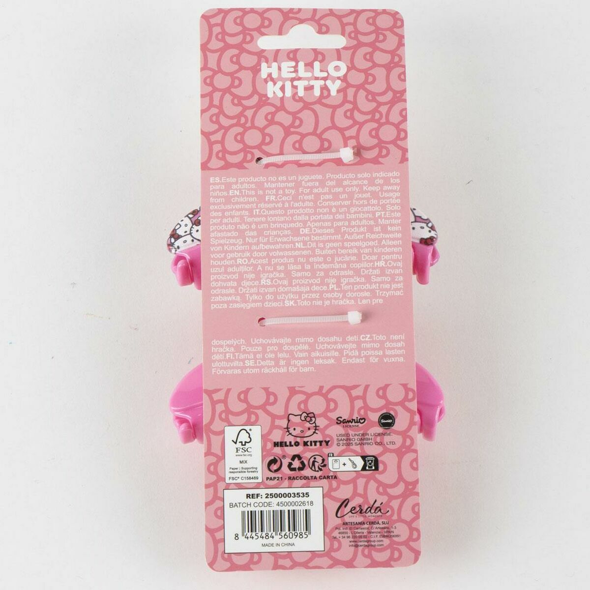 Hello Kitty rose hair clips packaging featuring detailed product information and brand logo.