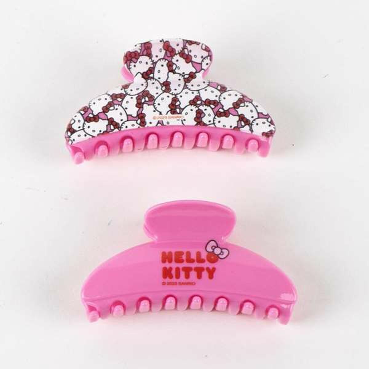 Pinces à cheveux Hello Kitty Rose en deux modèles, coloris rose avec motifs Hello Kitty.