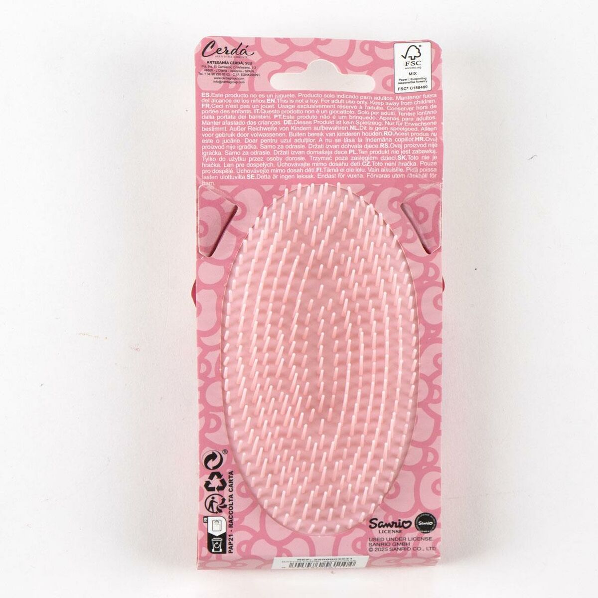 Brosse Démêlante Hello Kitty rose en packaging, 100 % ABS pour un coiffage doux et efficace.