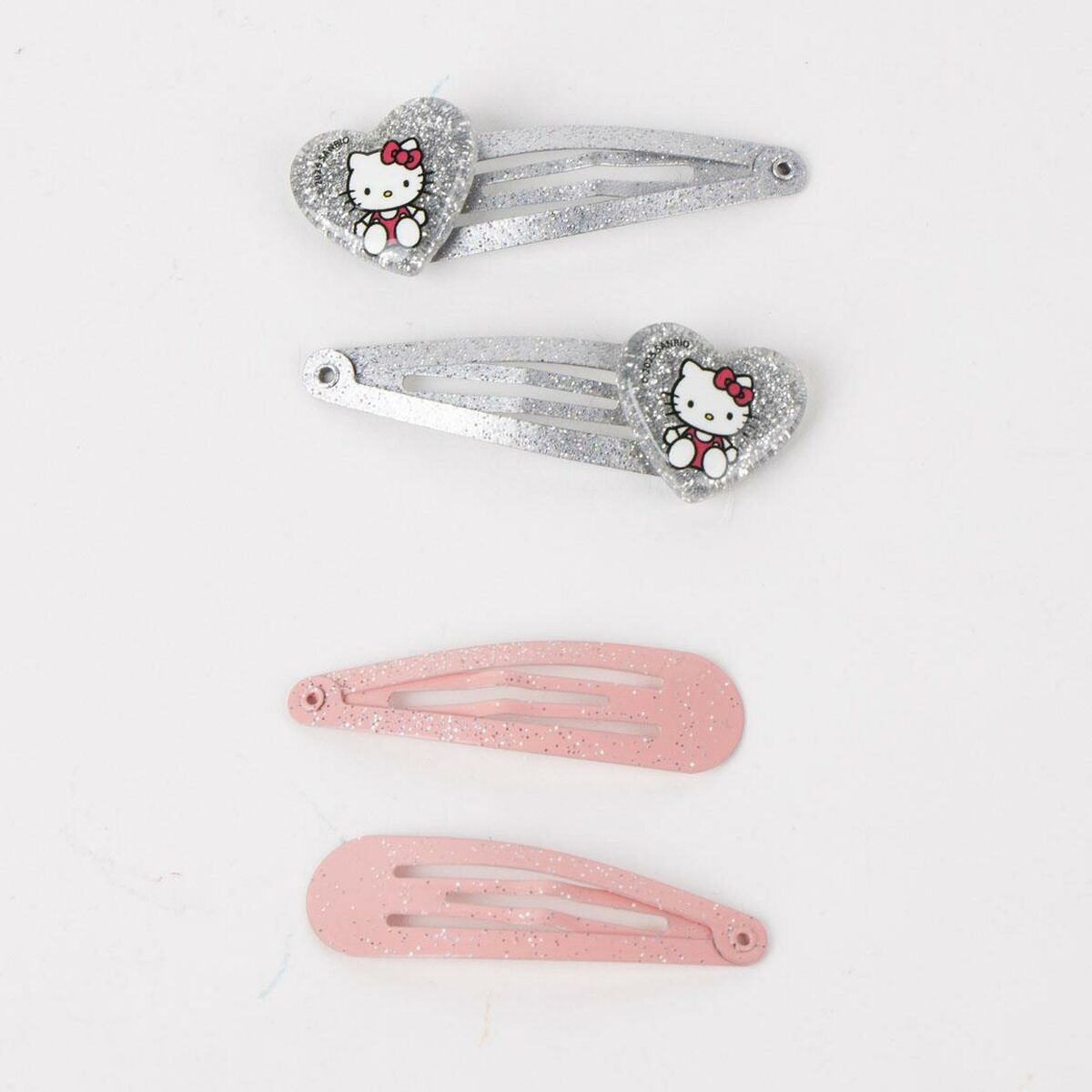 Set of 4 Hello Kitty hair clips including heart-shaped glitter designs and pink barrettes for kids.