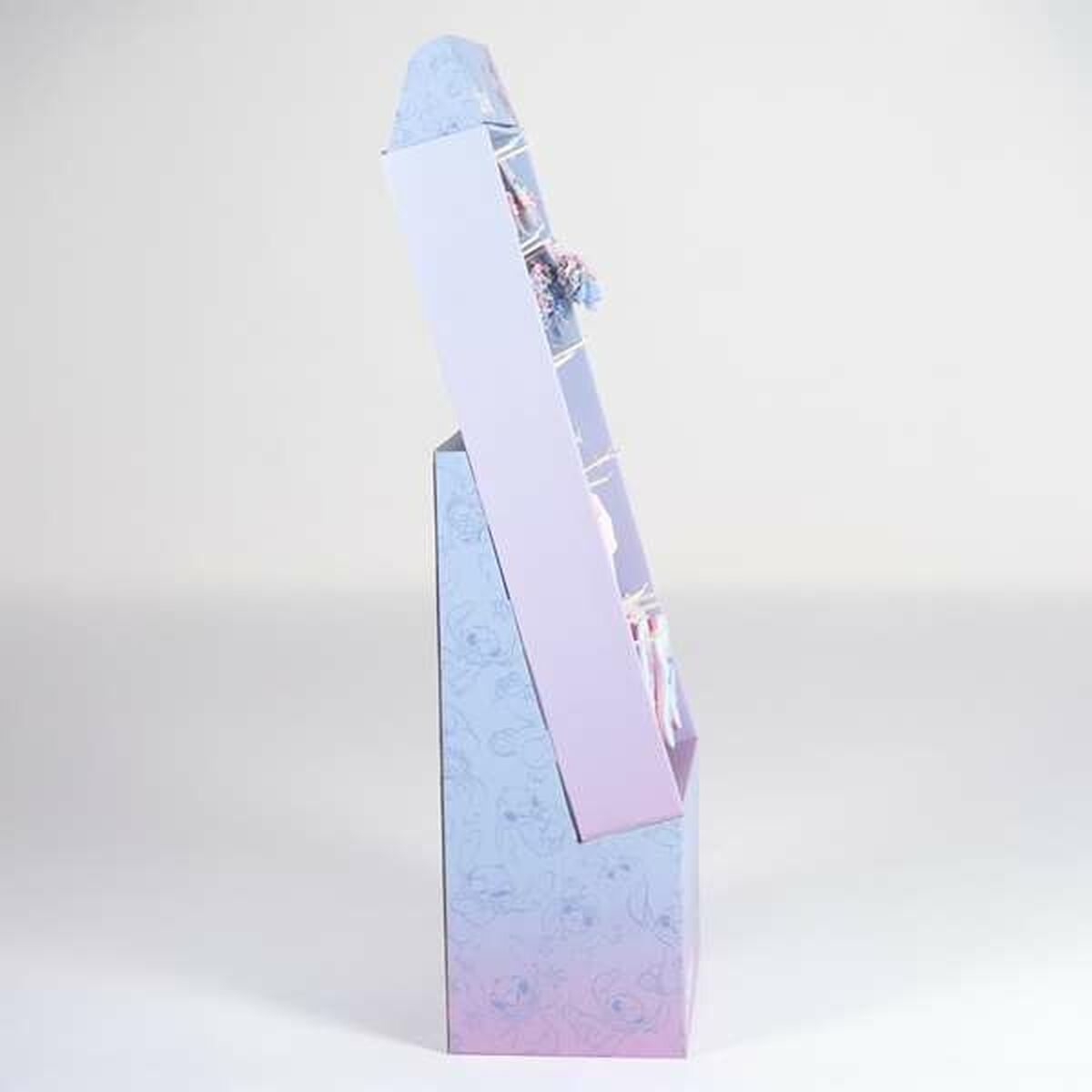 Stand displaying colorful products in a stylish, modern design with gradient colors.