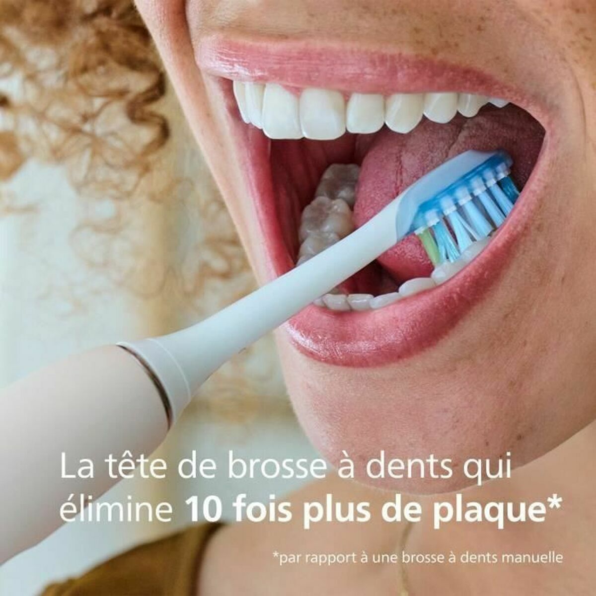 Brosse à dents électrique Philips avec tête de rechange, évitant 10 fois plus de plaque dentaire.